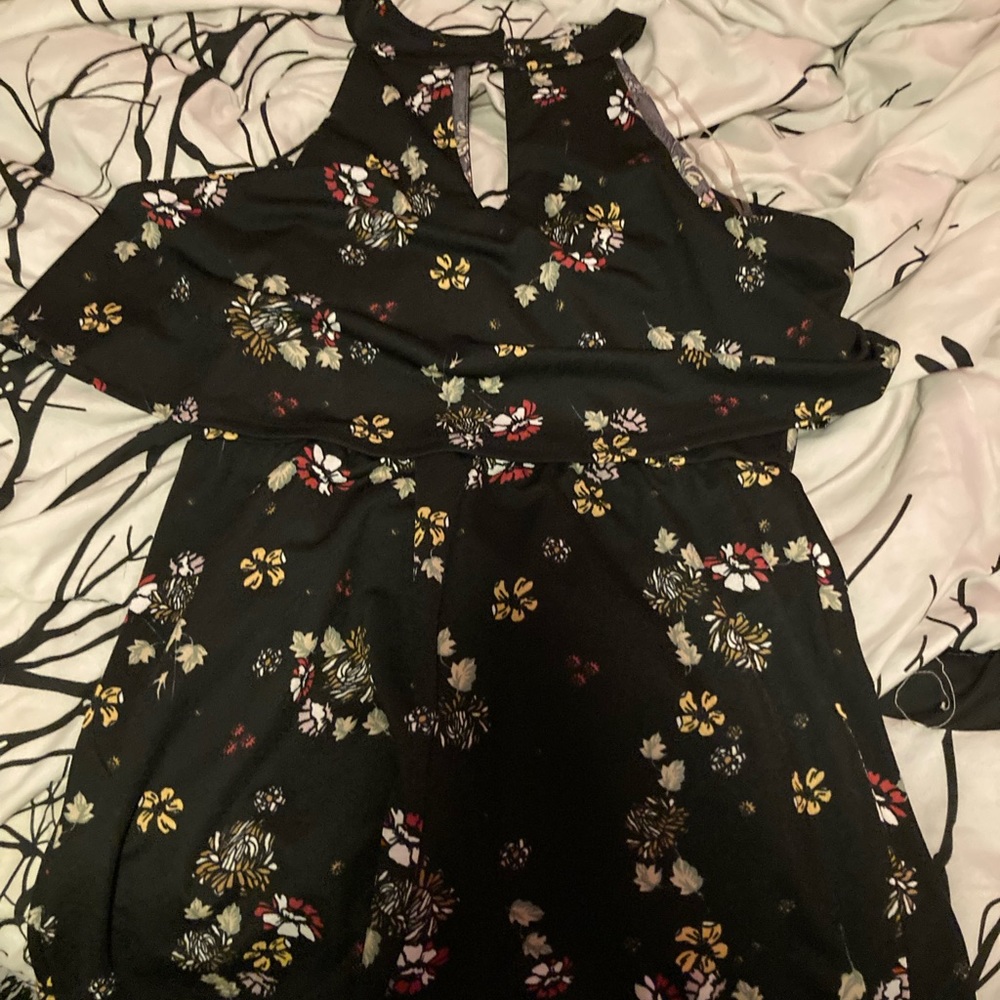 Size large romper worn once great condition.